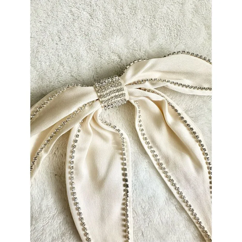 Off white rhinestone embellished hair bow